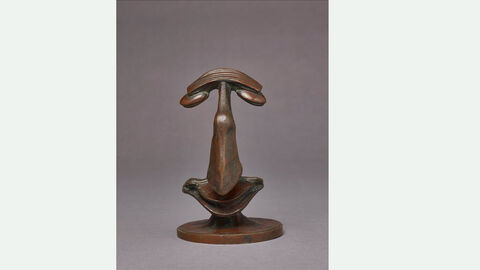 Bronze sculpture of a face